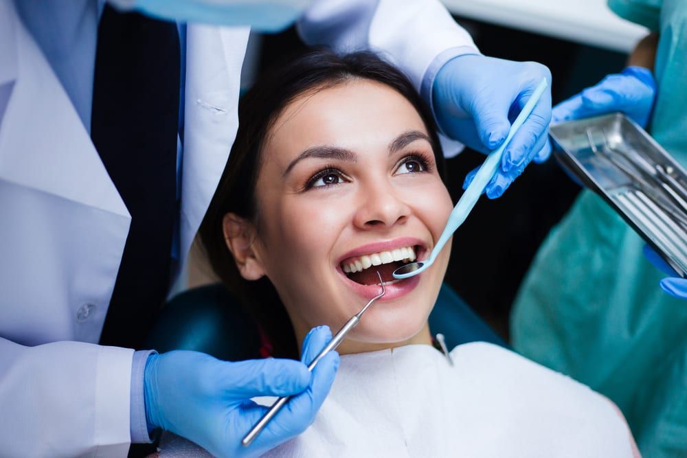 woman getting dental services